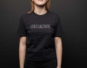 cropped view of woman in blank basic black t-shirt on black background